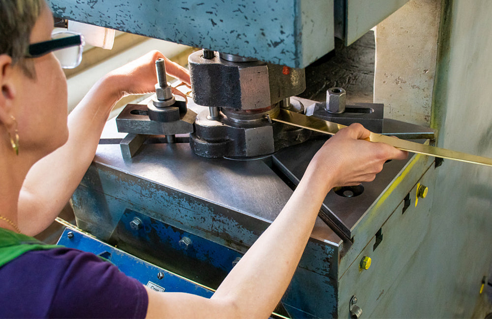 Stainless steel tabletop manufacturer stamping process — coil feeding into production line for custom stamped stainless steel tray range